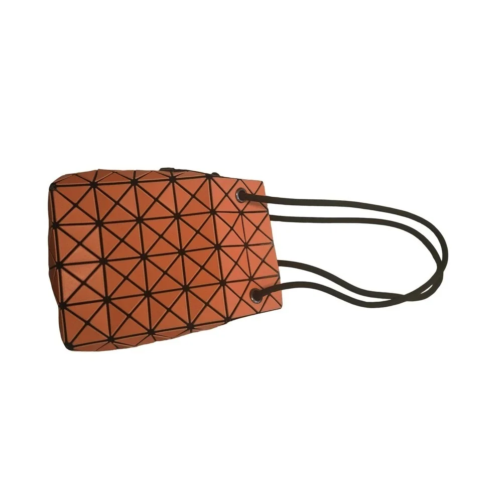Bao Bao Issey Miyake Wring Matte Orange Bucket Bag, direct from Taipei. Abstract